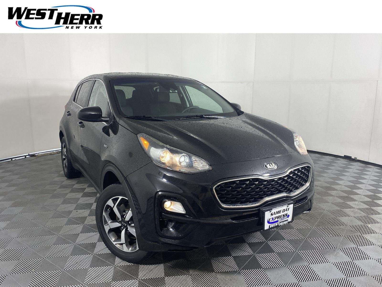 Used 2020 Black Cherry Kia LX image 1