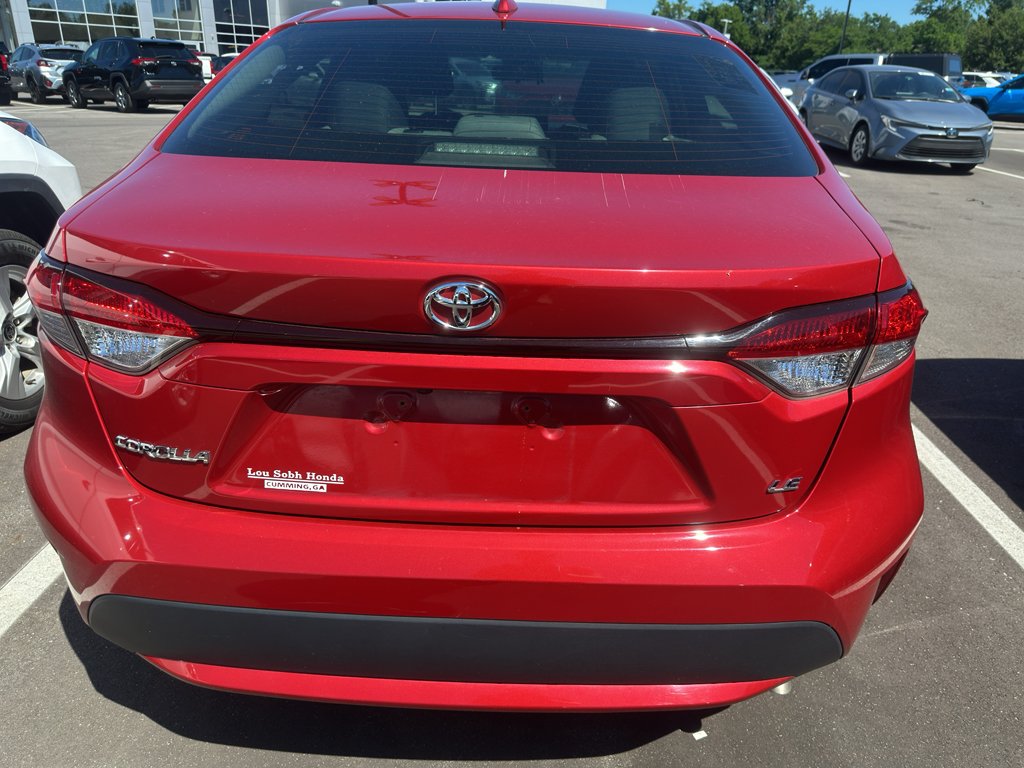 Used 2020 Barcelona Red Metallic Toyota LE image 3