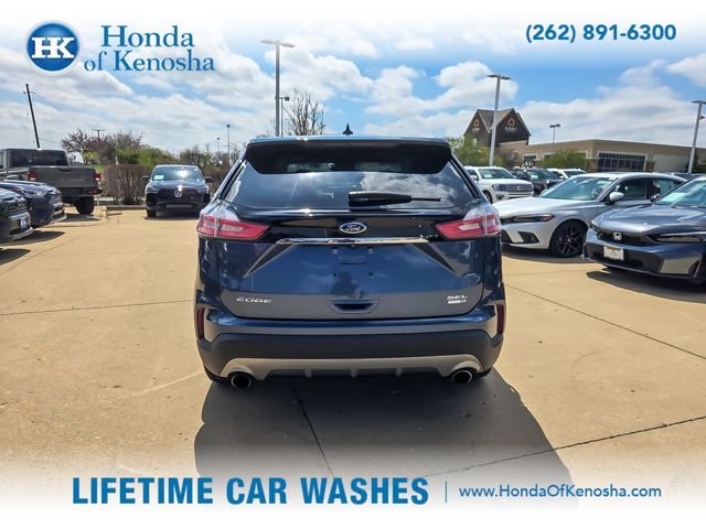 Used 2019 Blue Metallic Ford SEL image 4