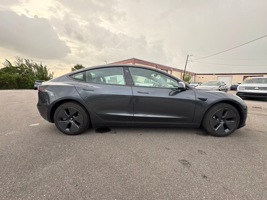 Used 2023 Tesla Model 3 Base with VIN 5YJ3E1EAXPF662363 for sale in Tampa, FL