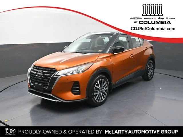 Used 2022 Orange Nissan SV image 1