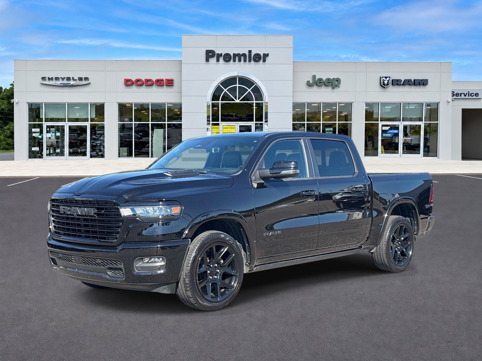 Used 2025 Diamond Black Crystal Pearlcoat Ram Laramie image 1