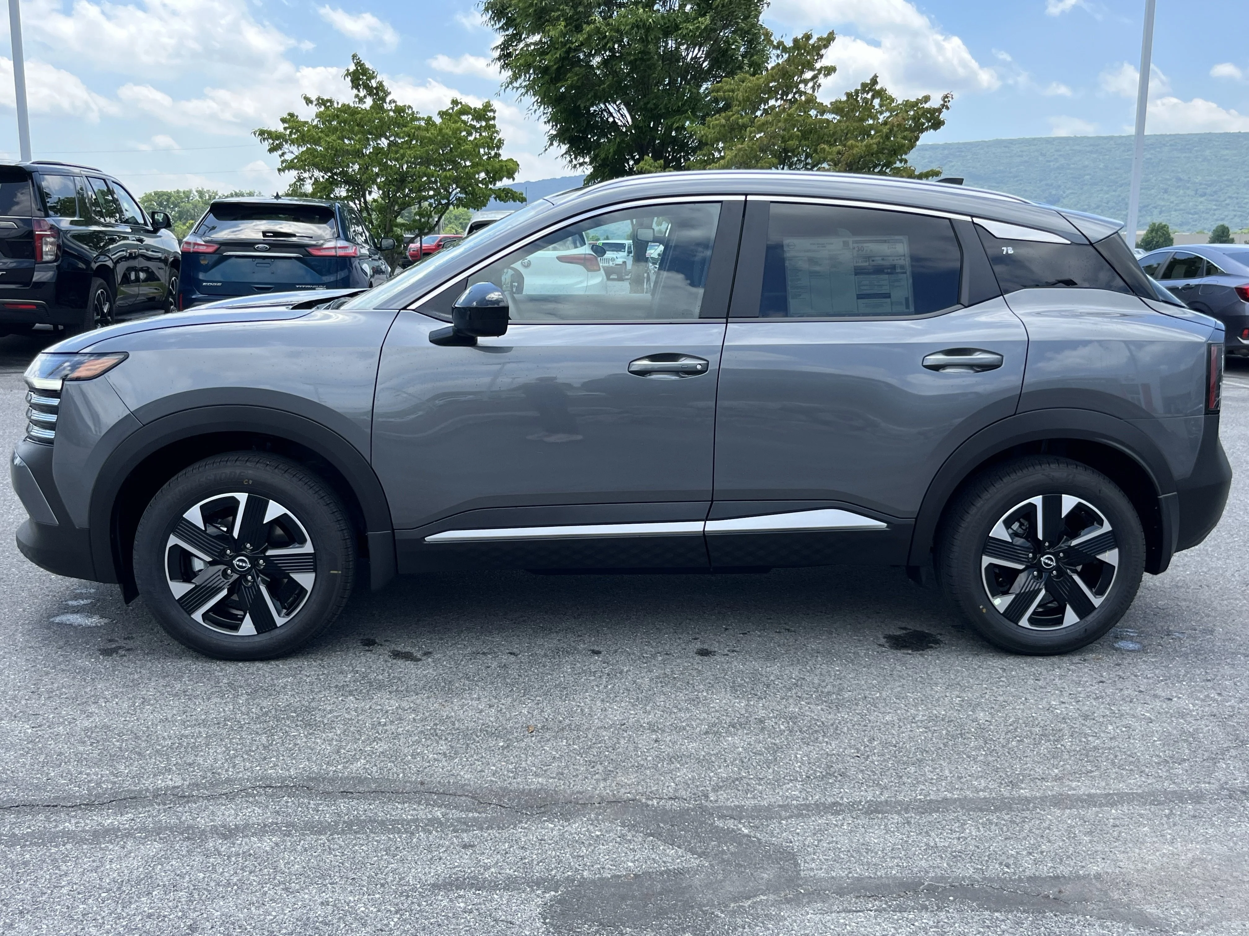 New 2026 Gun Metallic Nissan SV image 9