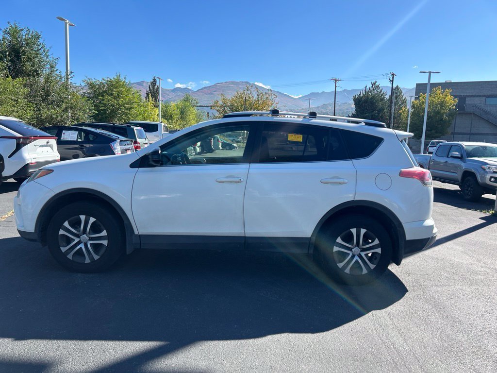 Used 2016 Super White Toyota LE image 14