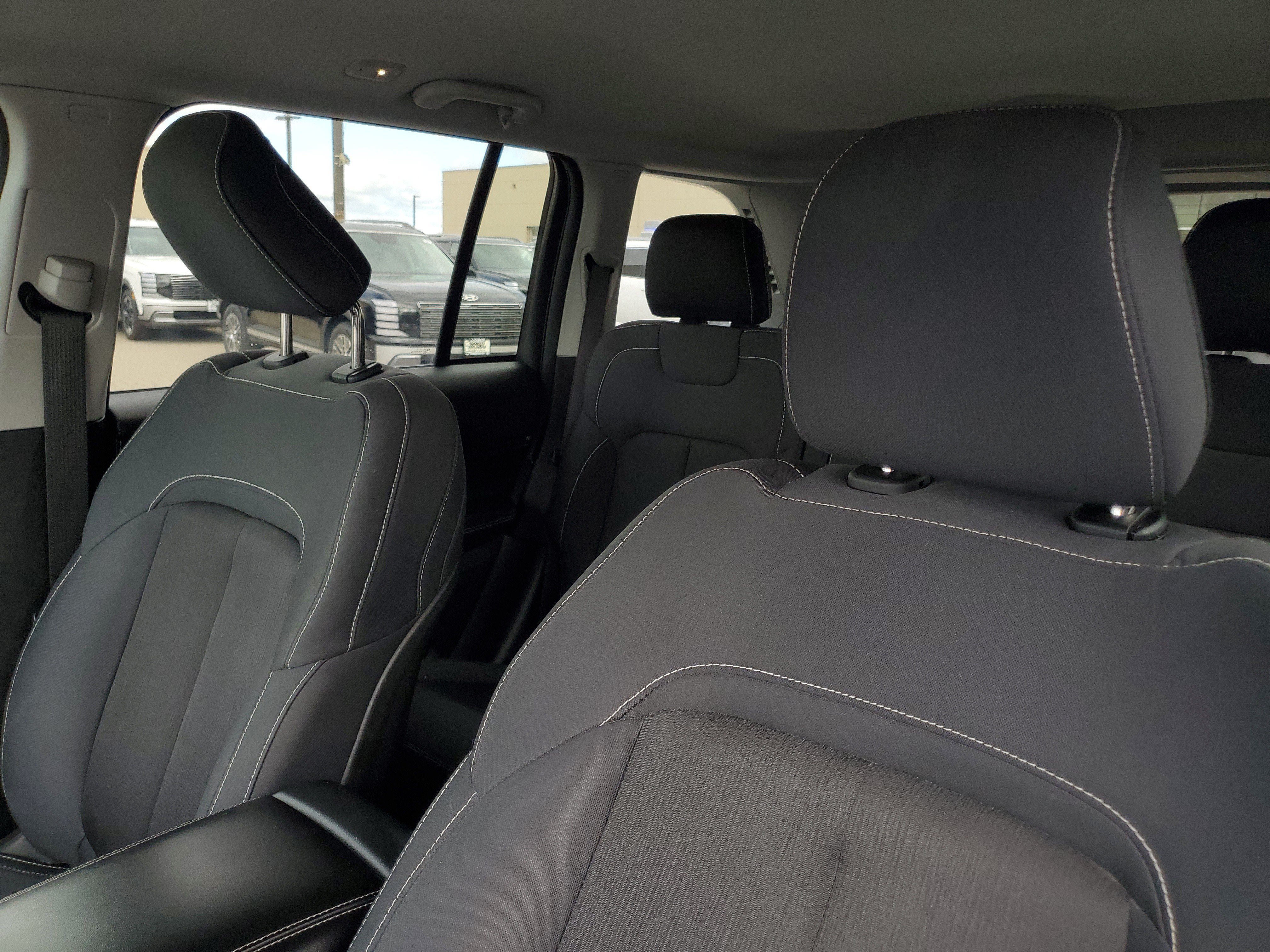 Used 2023 Velvet Red Pearlcoat Jeep Laredo image 20
