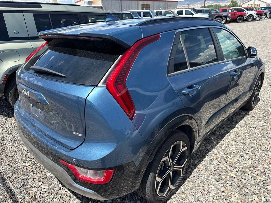 Used 2023 Mineral Blue Kia EX Touring image 22