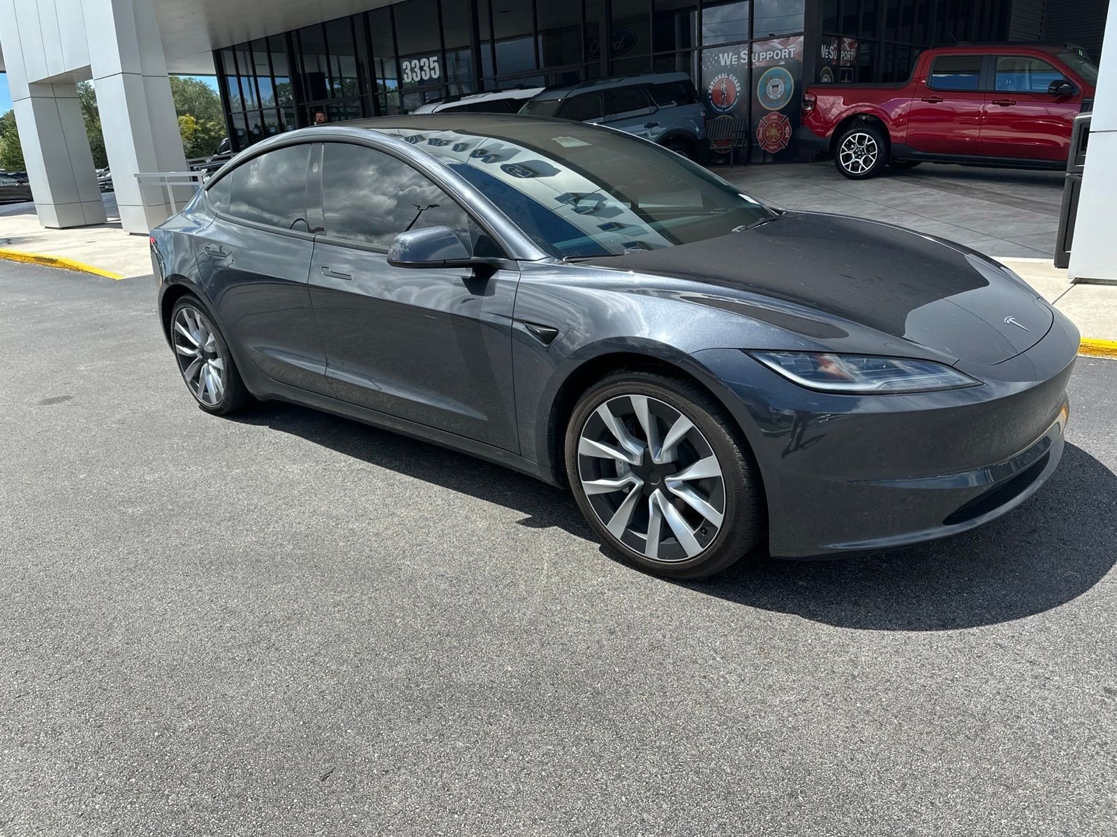 Used 2024 Gray Tesla Long Range image 1