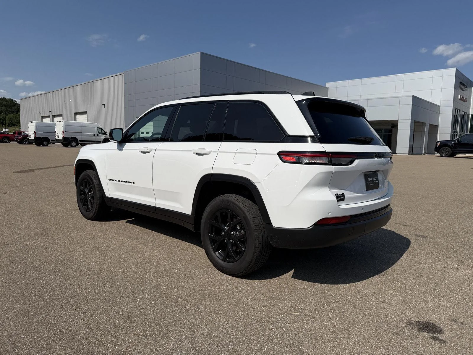Used 2024 Bright White Clearcoat Jeep Altitude image 4