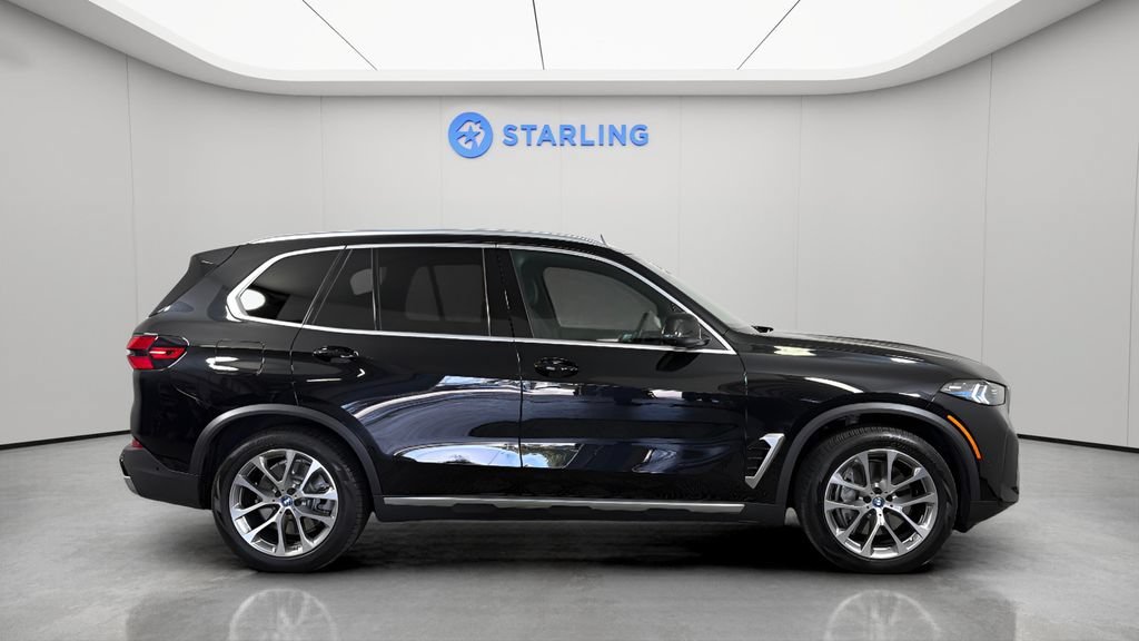 Used 2025 Black BMW xDrive50e image 11