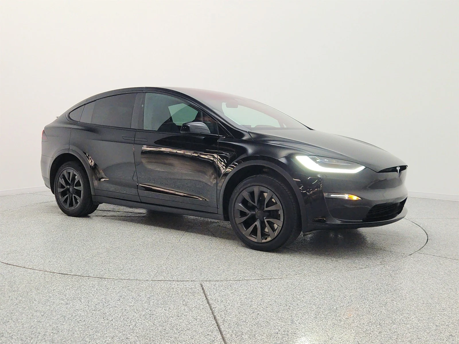 Used 2023 Solid Black Tesla AWD image 3