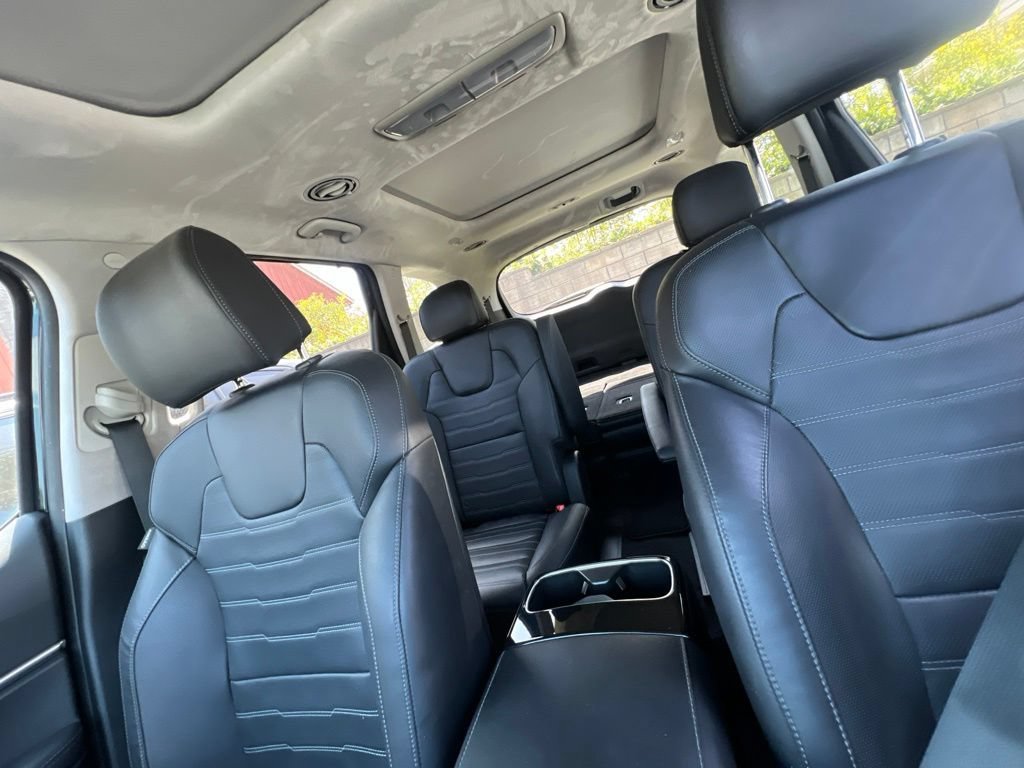 Used 2023 Ebony Black Kia SX Prestige image 16
