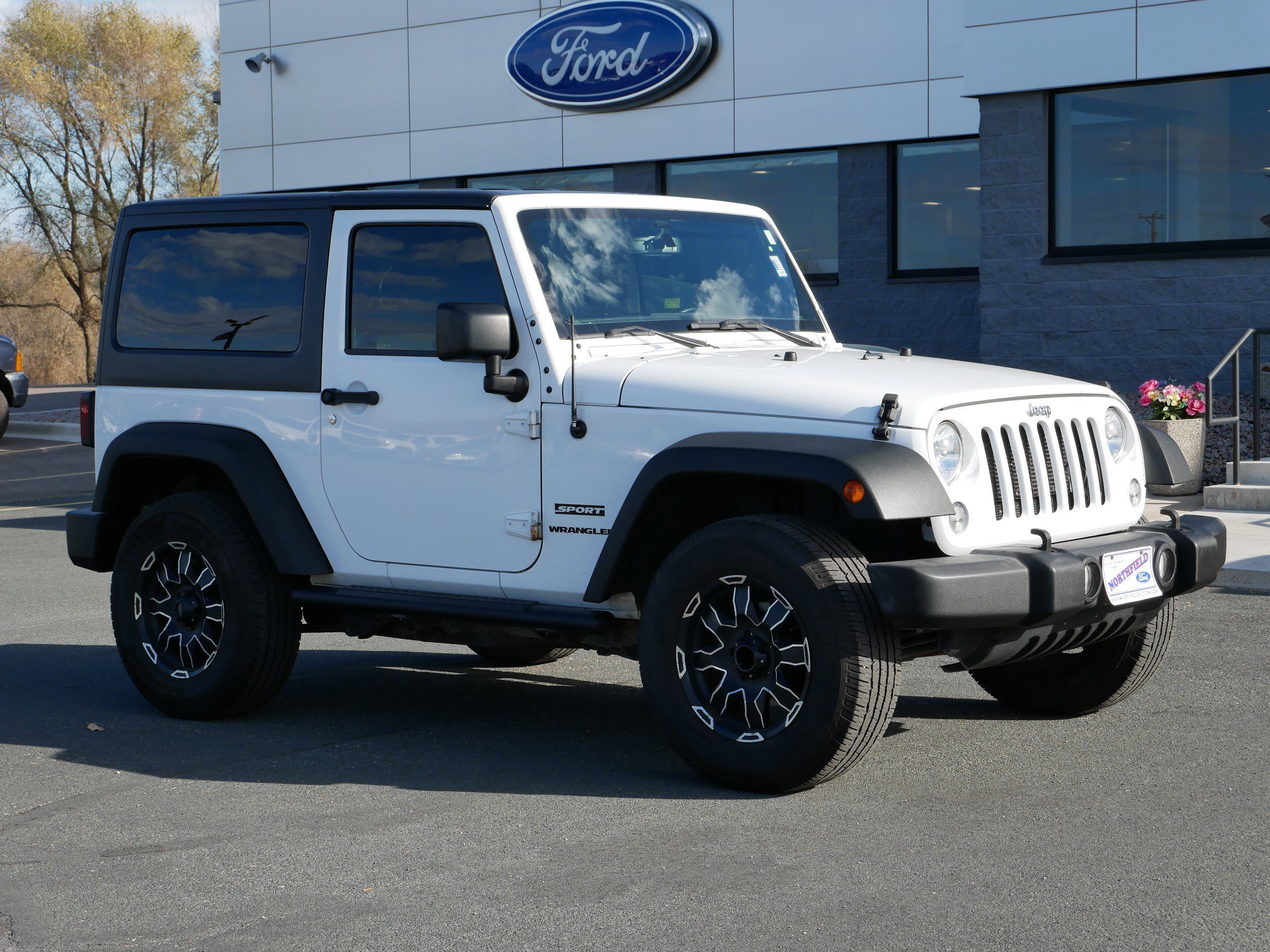 Used 2016 Jeep Wrangler Sport S with VIN 1C4AJWAGXGL225356 for sale in Northfield, Minnesota