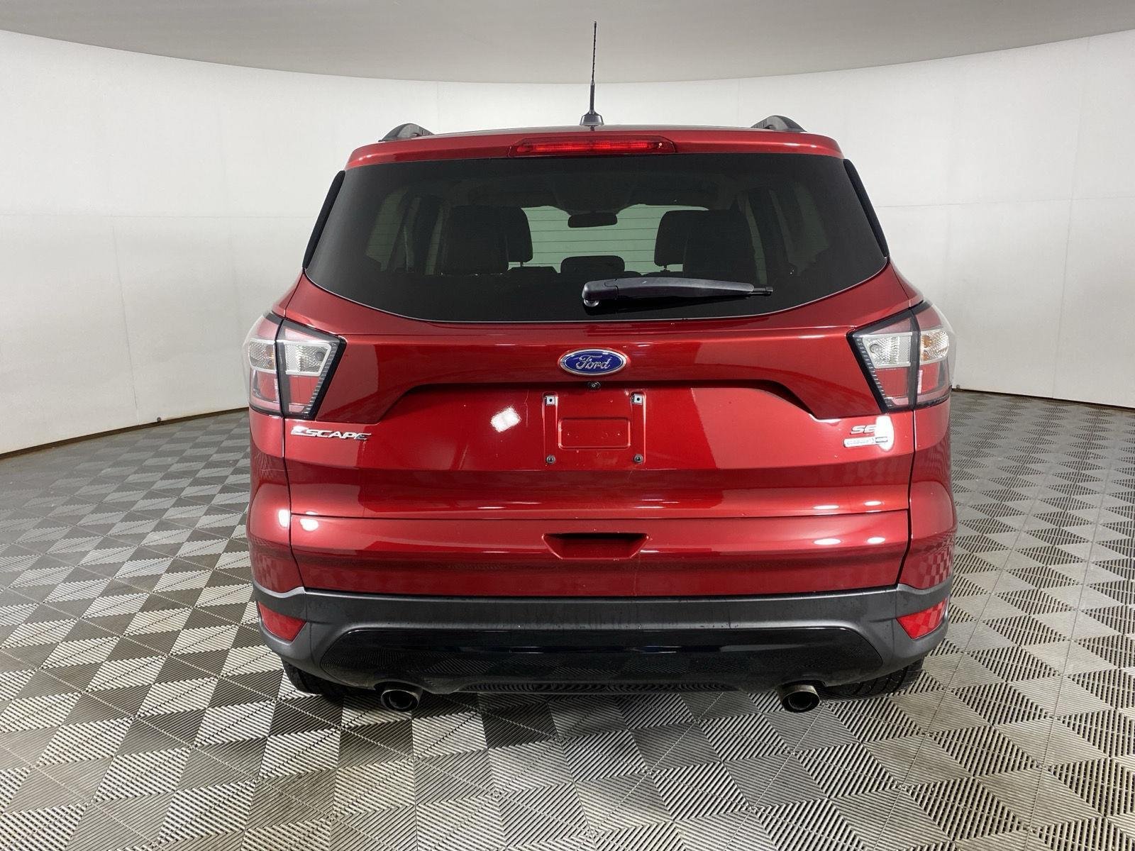 Used 2017 Ruby Red Metallic Tinted Clearcoat Ford SE image 6