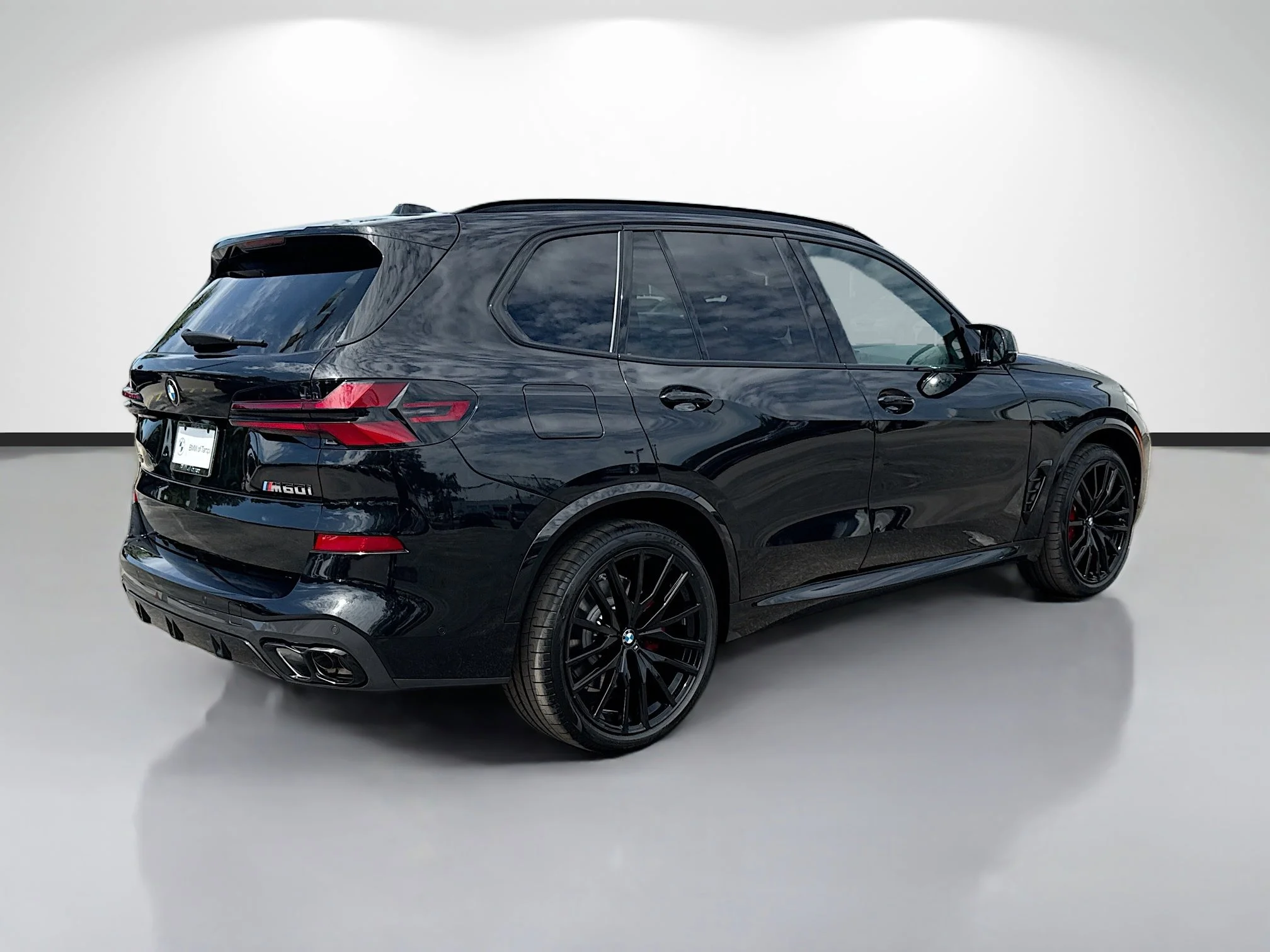 New 2026 Black Sapphire Metallic BMW M60i image 3