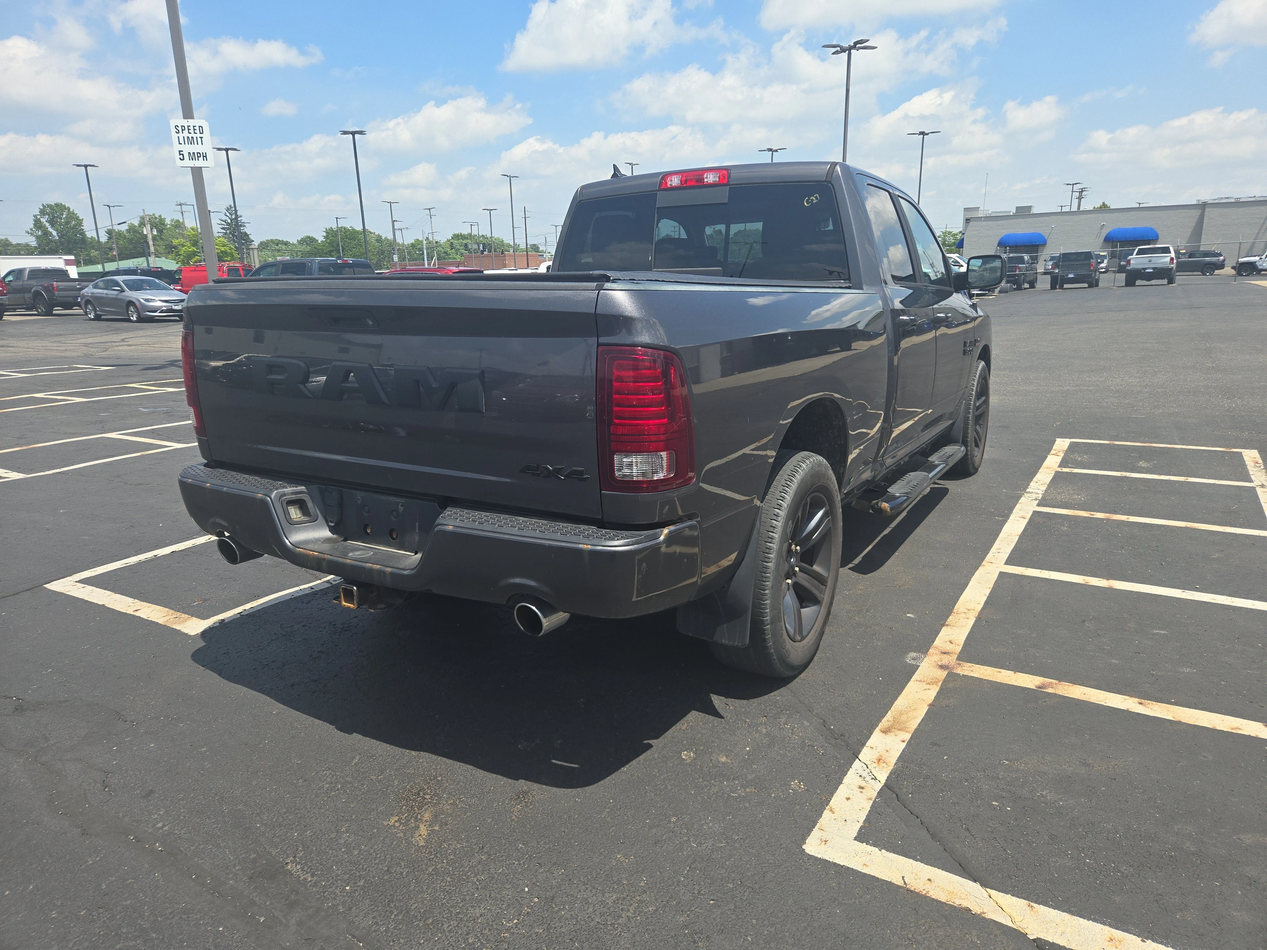 Used 2017 Granite Crystal Metallic Clearcoat Ram Night image 5