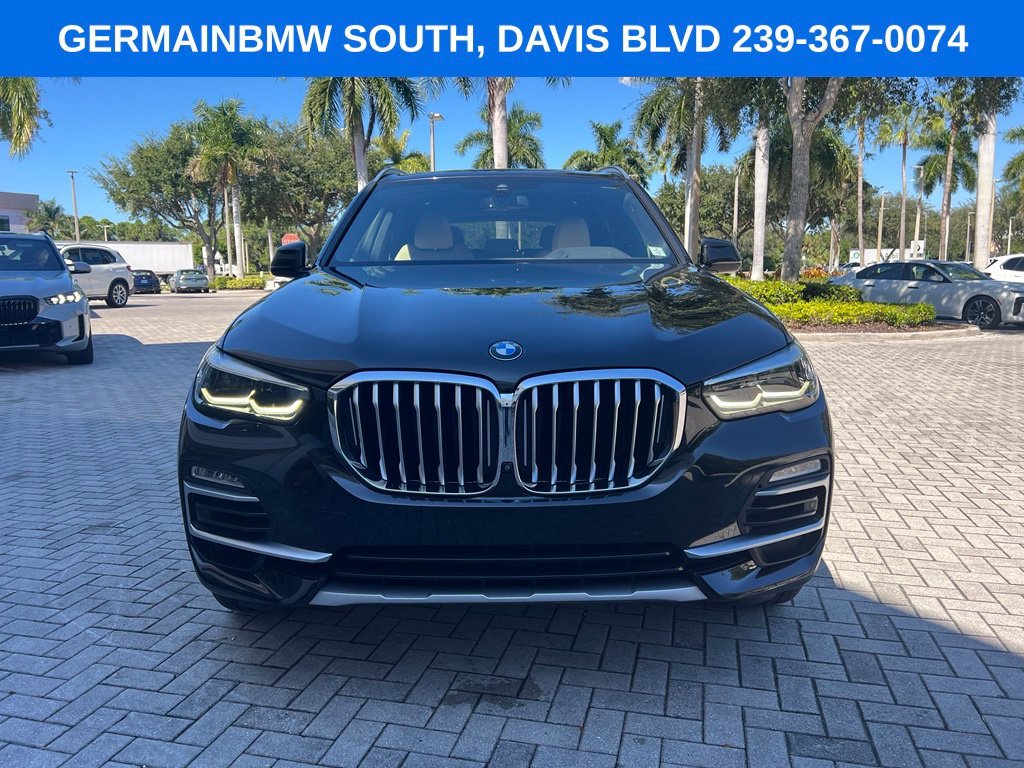 Used 2021 Black Sapphire Metallic BMW sDrive40i image 3