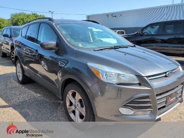 Used 2016 Gray Ford SE image 1