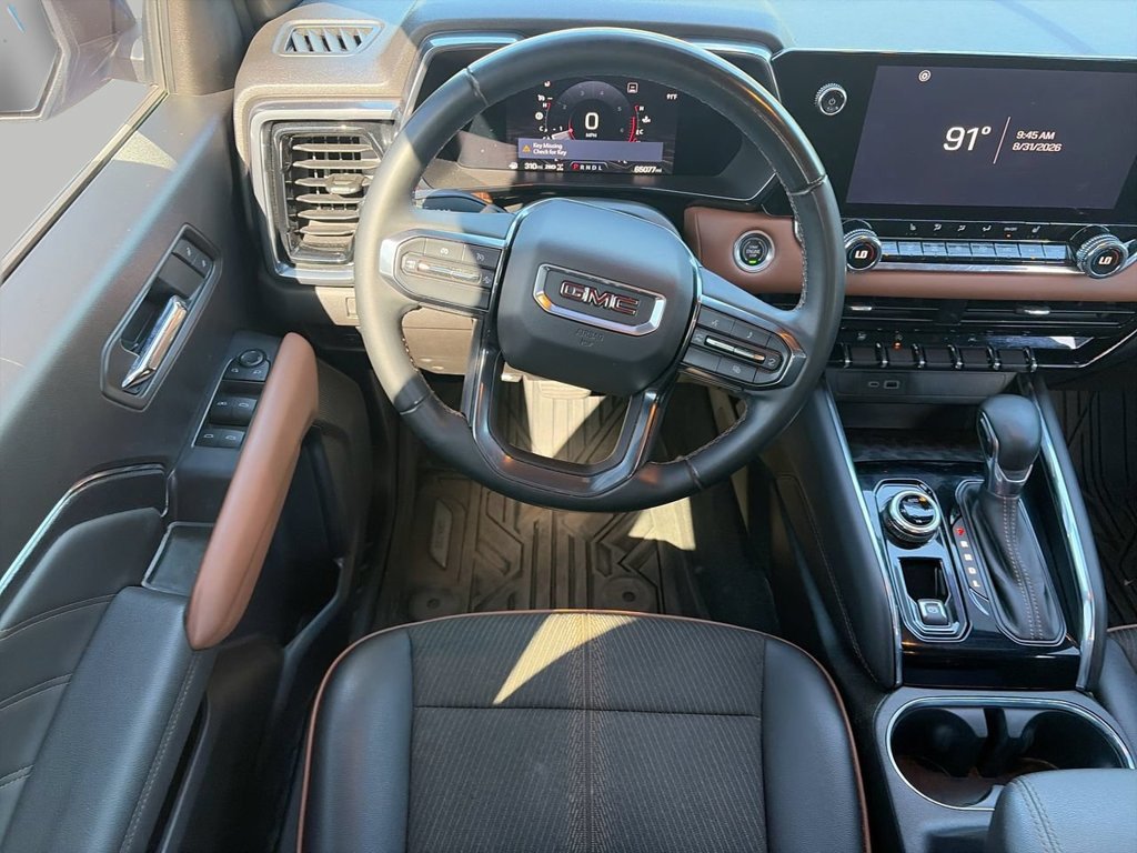 Used 2023 DYNAMIC BLUE METALLIC GMC 4WD AT4 image 11