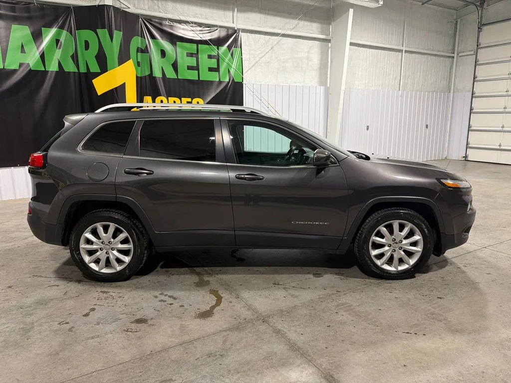 Used 2016 Granite Crystal Metallic Clearcoat Jeep Limited image 4
