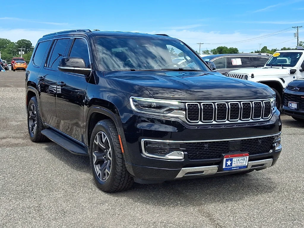Used 2023 Diamond Black Crystal Pearlcoat Jeep Series III image 2