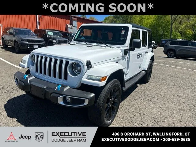 Used 2023 White Jeep Sahara 4xe image 1