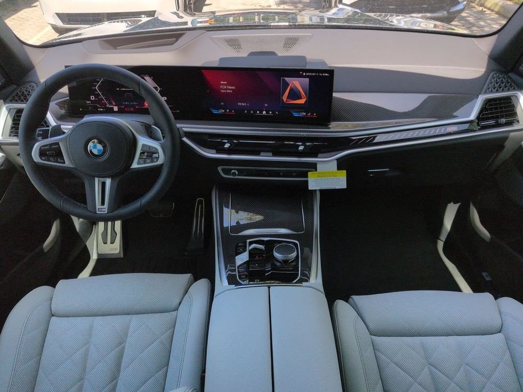 New 2026 Black Sapphire Metallic BMW M60i image 15