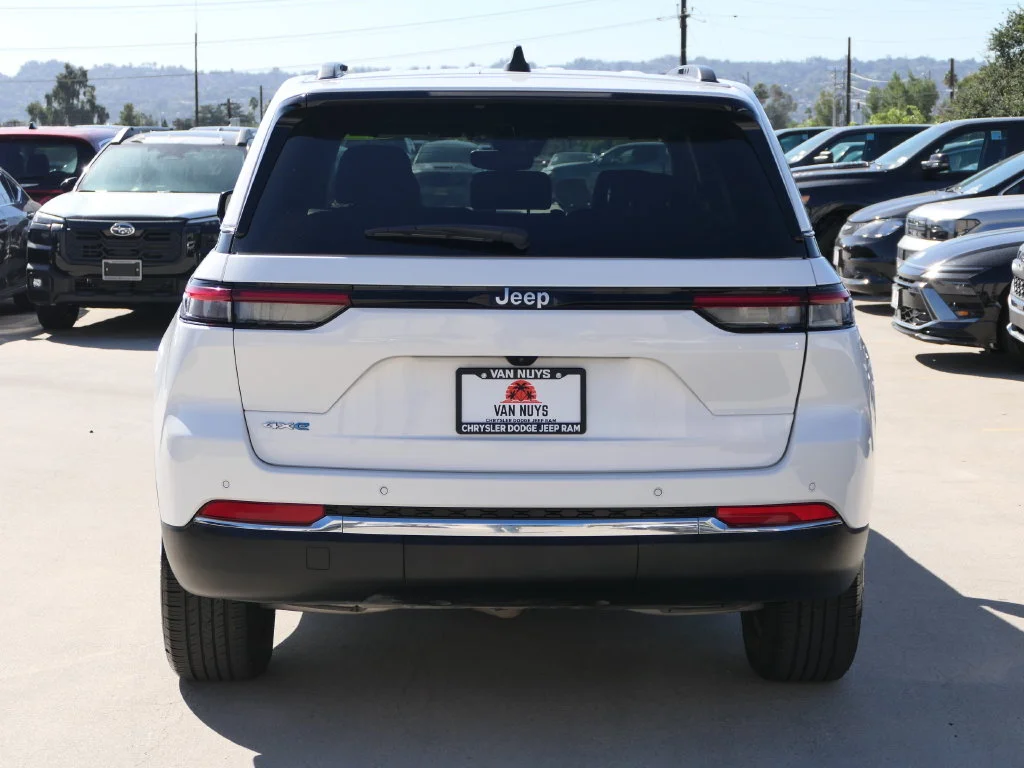 Used 2024 Bright White Clearcoat Jeep 4xe image 4
