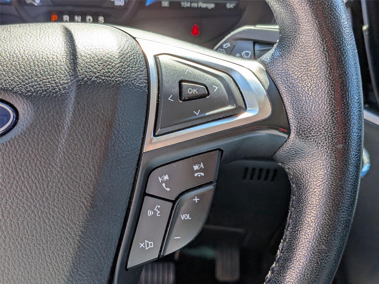 Used 2023 Agate Black Metallic Ford SEL image 20