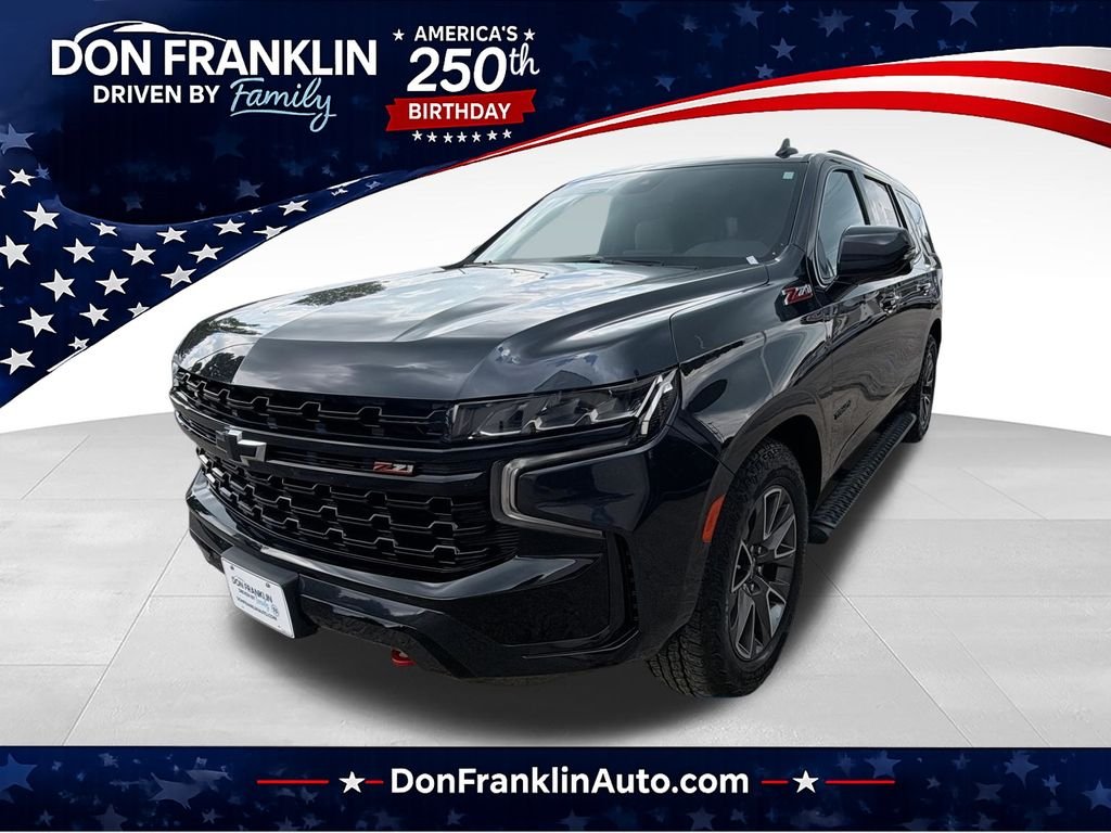 Used 2024 Gray Chevrolet Z71 image 1
