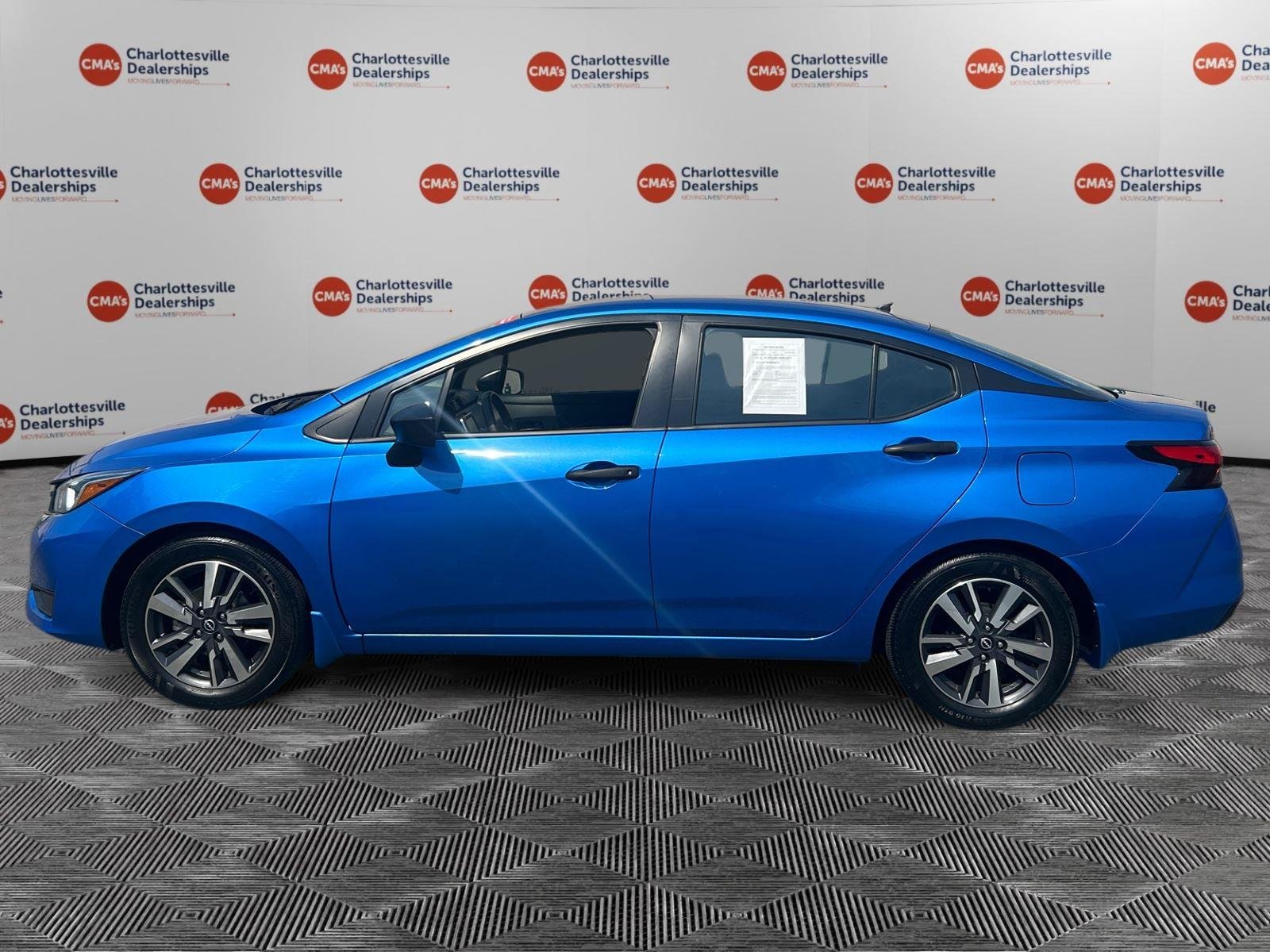 Used 2024 Electric Blue Metallic Nissan S image 2