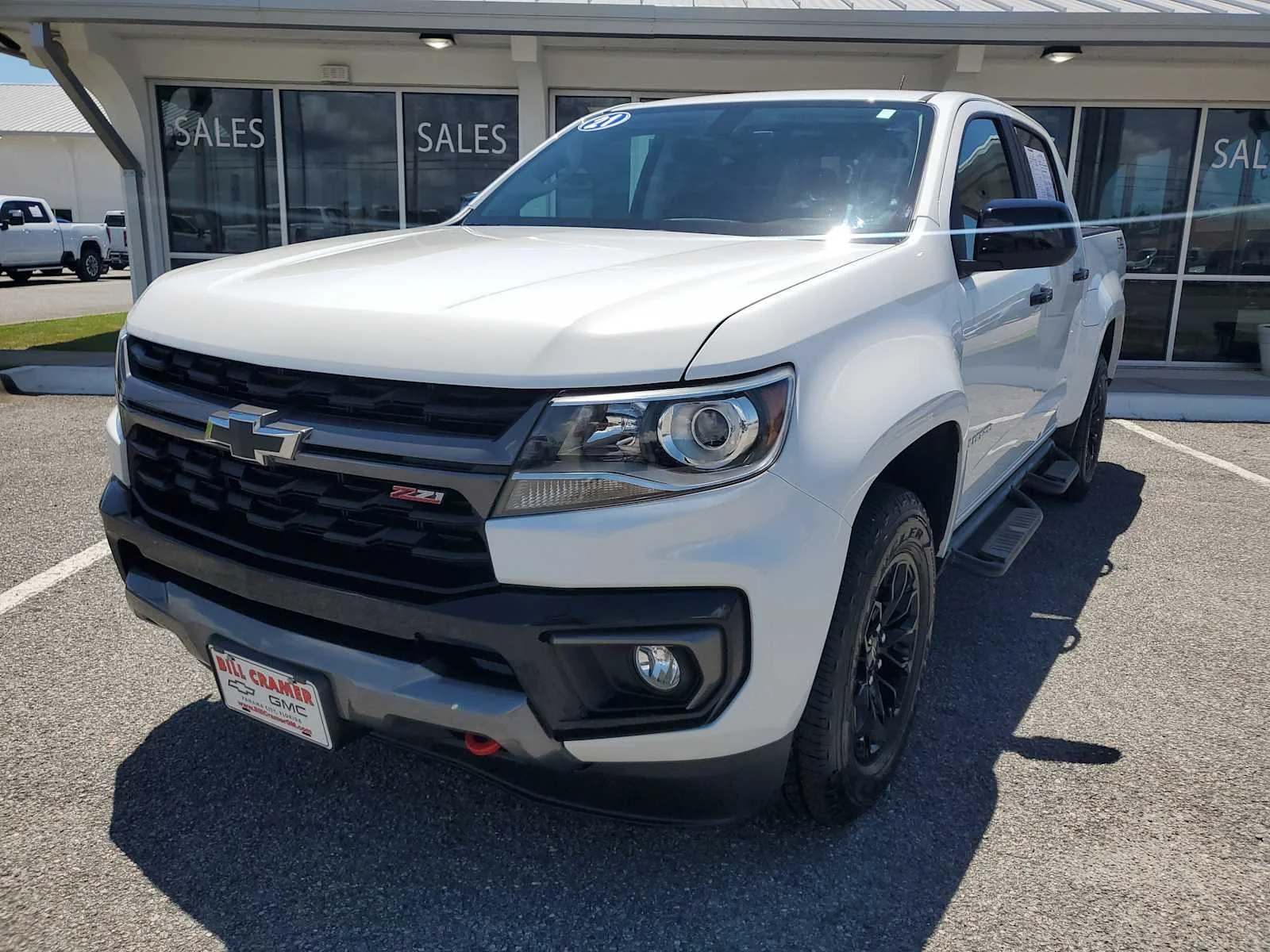 Used 2021 SUMMIT WHITE Chevrolet 4WD Z71 image 1