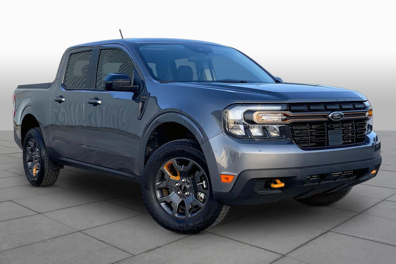 Used 2024 Carbonized Gray Metallic Ford LARIAT Advanced image 3