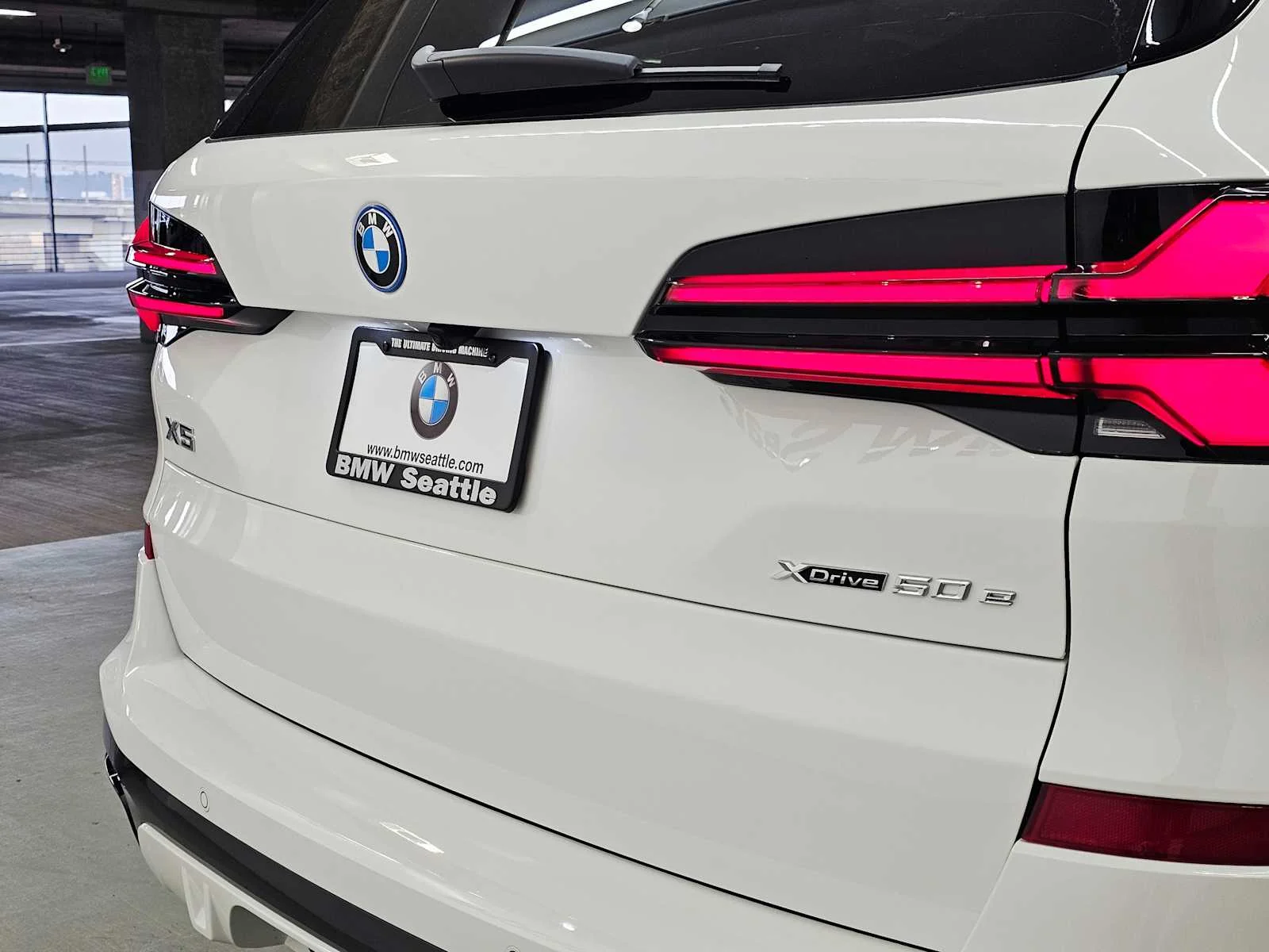 New 2026 Alpine White BMW xDrive50e image 7