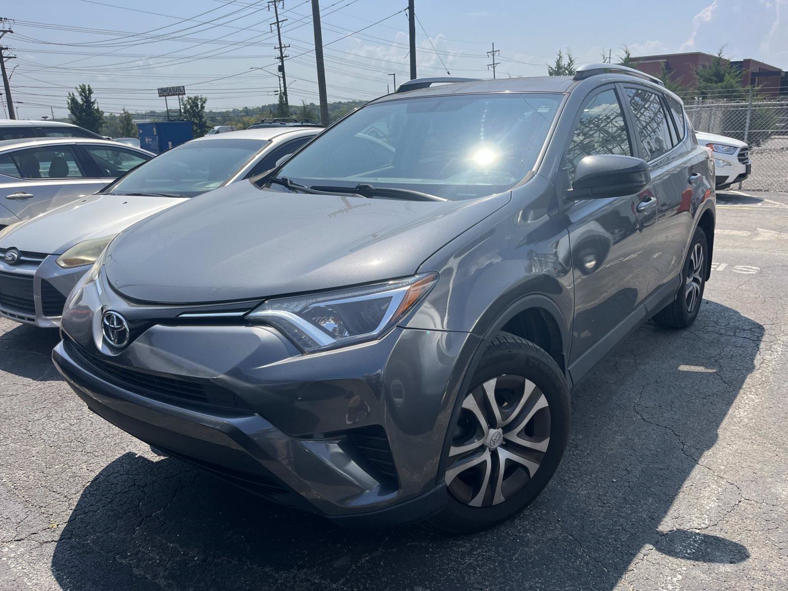 Used 2016 Magnetic Gray Metallic Toyota LE image 2