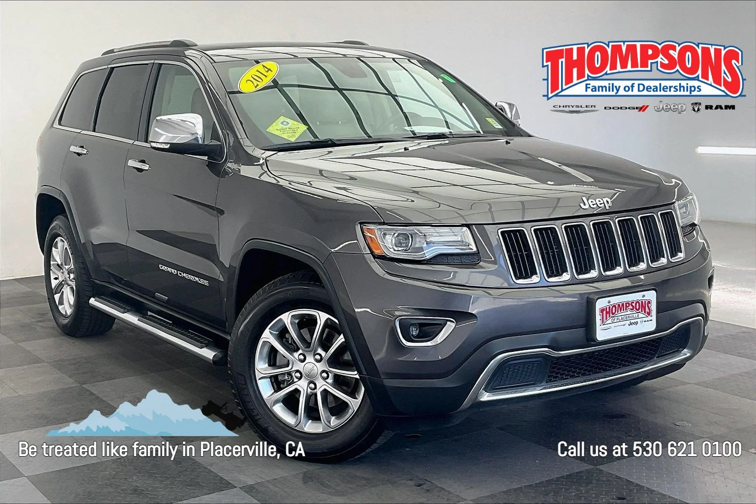 Used 2014 Granite Crystal Metallic Clearcoat Jeep Limited image 1
