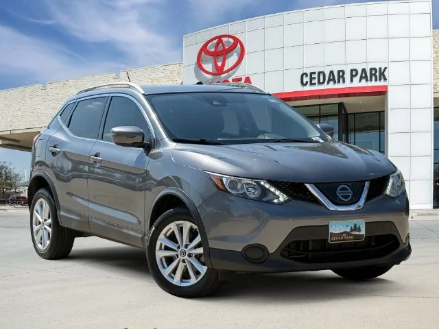 Used 2019 Gun Metallic Nissan SV image 1