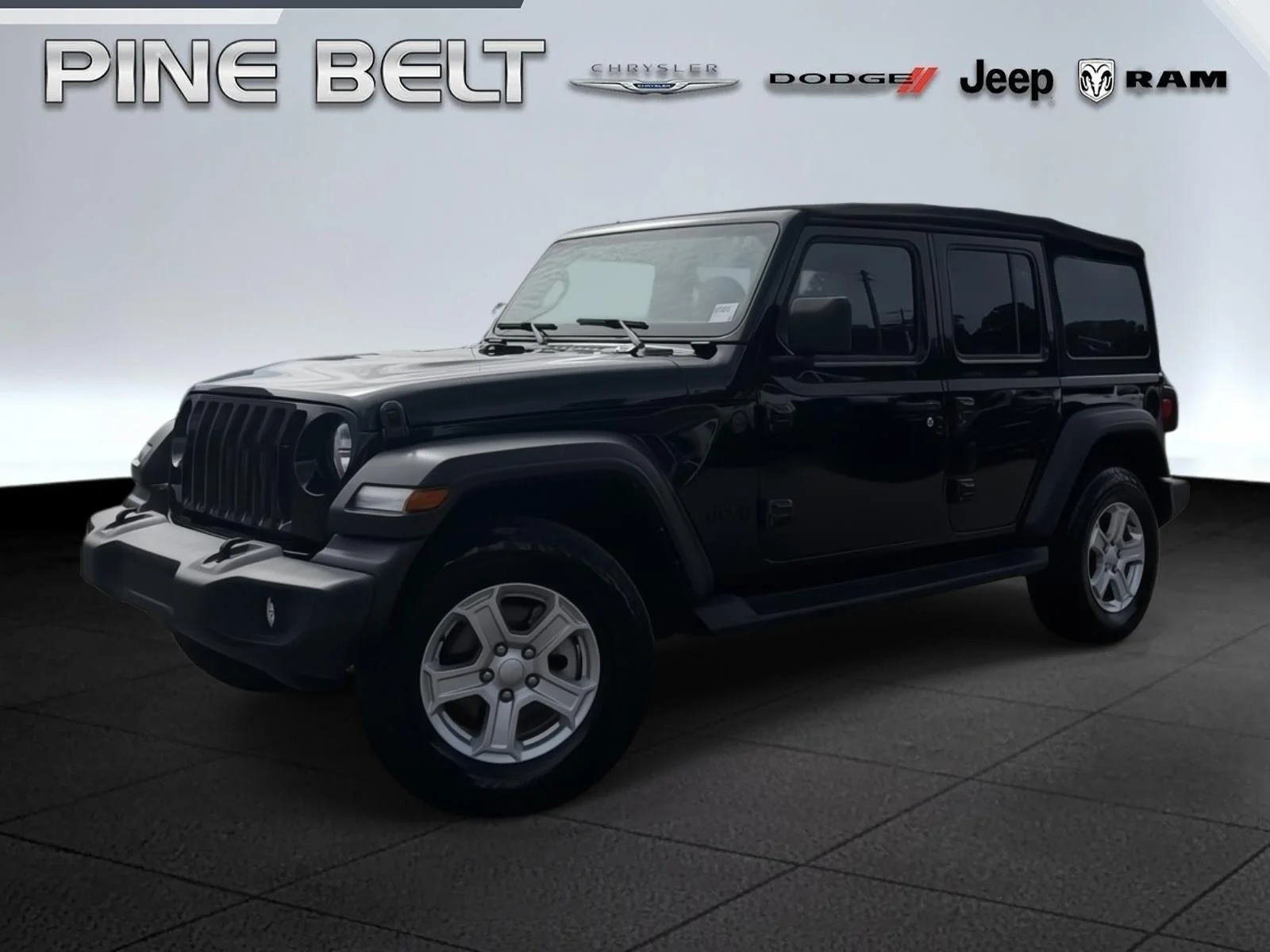 Used 2022 Black Clearcoat Jeep Unlimited Sport S image 1