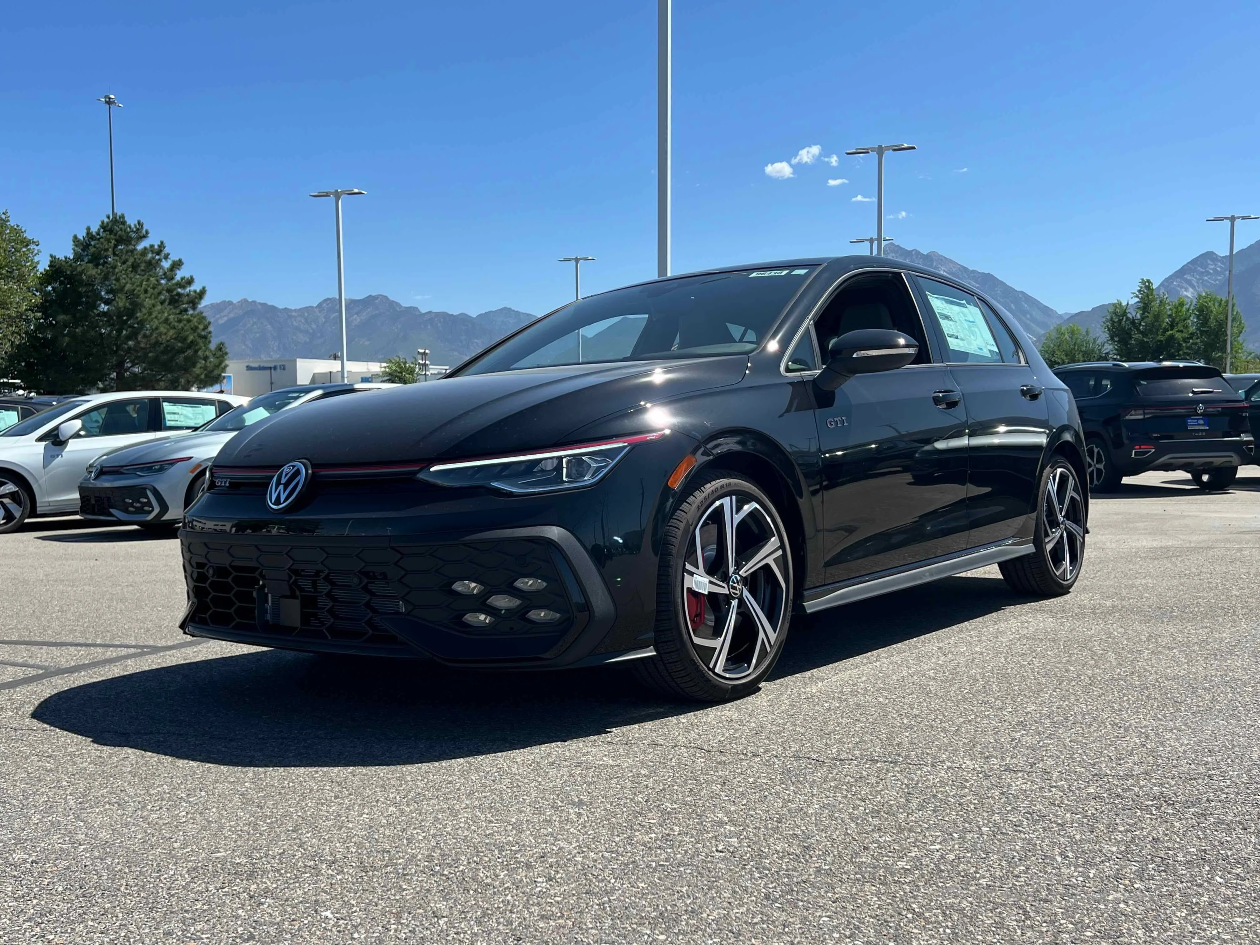 New 2025 Black Volkswagen SE image 5