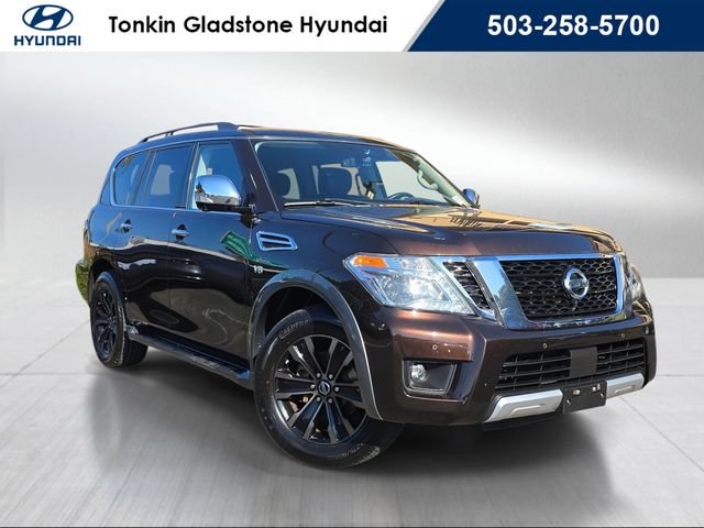 Used 2018 Almond Nissan Platinum image 1
