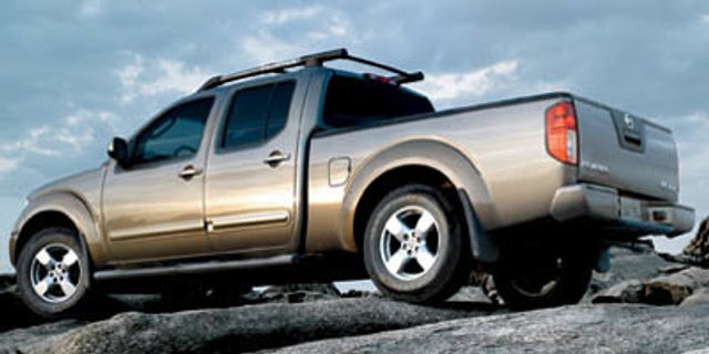 Pre-Owned 2007 Nissan Frontier SE RWD Crew Cab Pickup