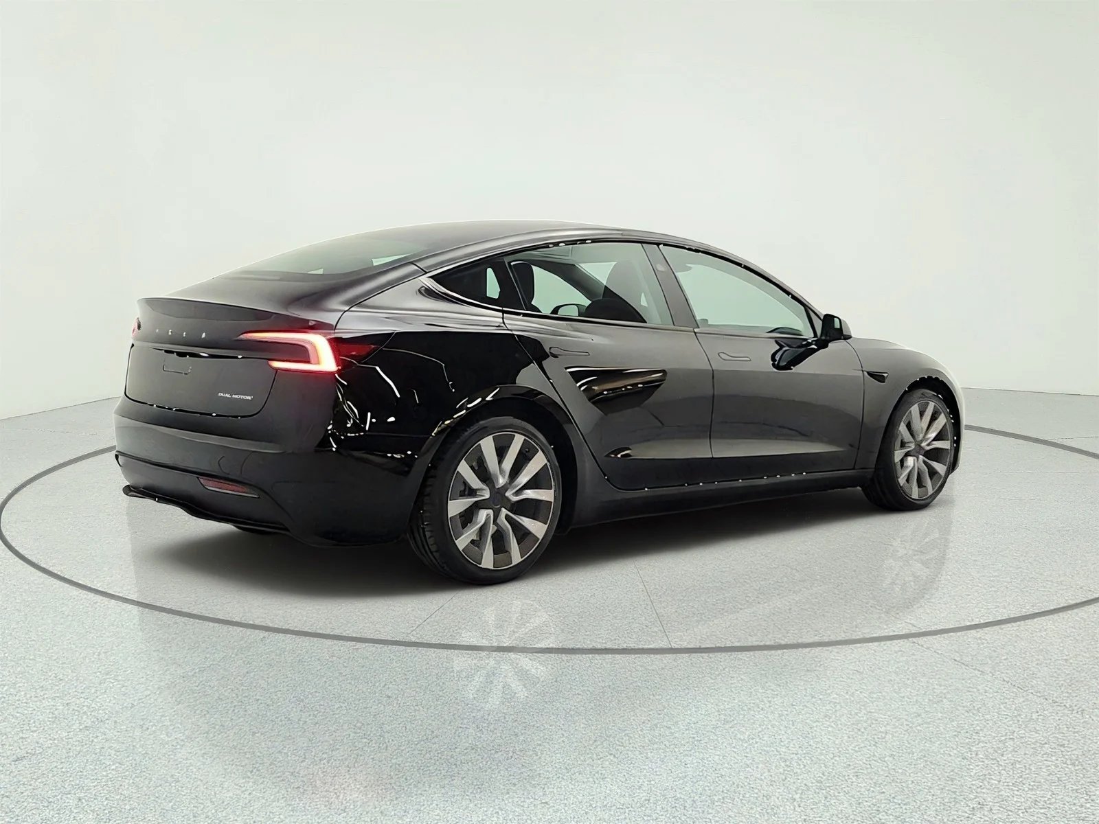 Used 2024 Solid Black Tesla Long Range image 5