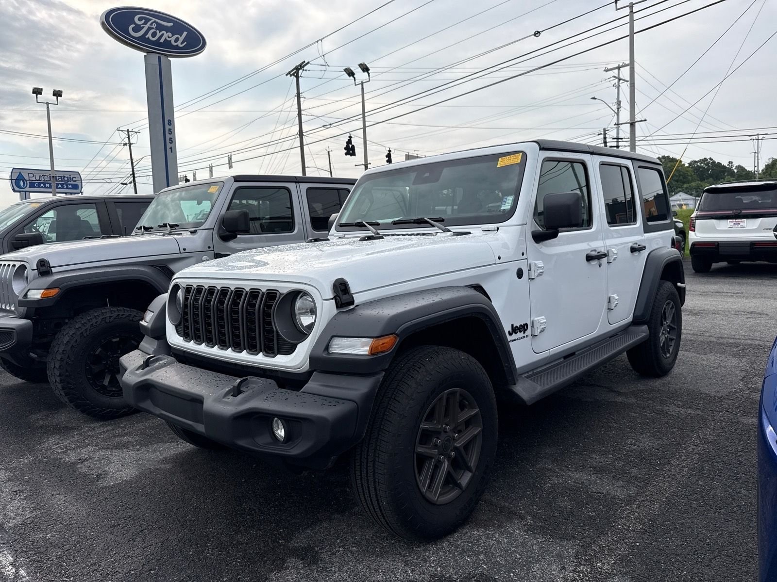 Used 2025 Bright White Clearcoat Jeep Sport S image 1