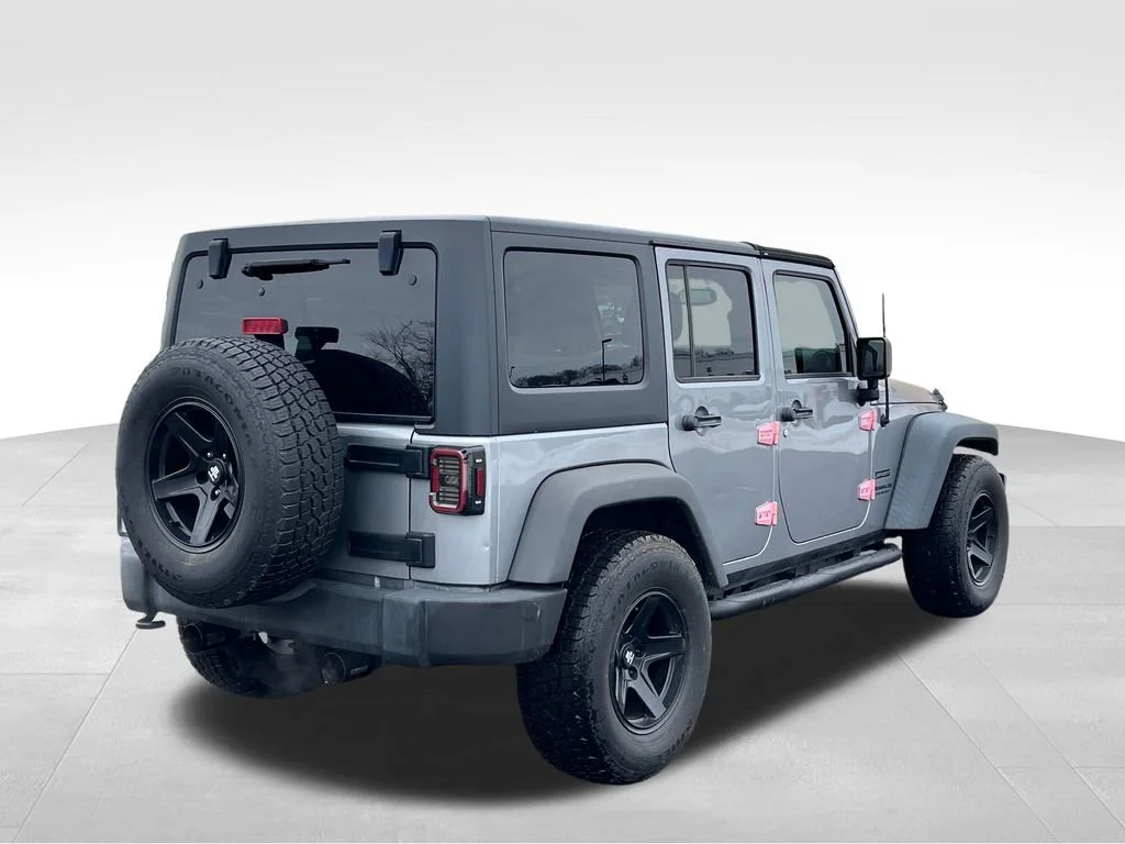 Used 2016 Jeep Wrangler Unlimited Sport S with VIN 1C4BJWDG5GL283875 for sale in Elyria, OH