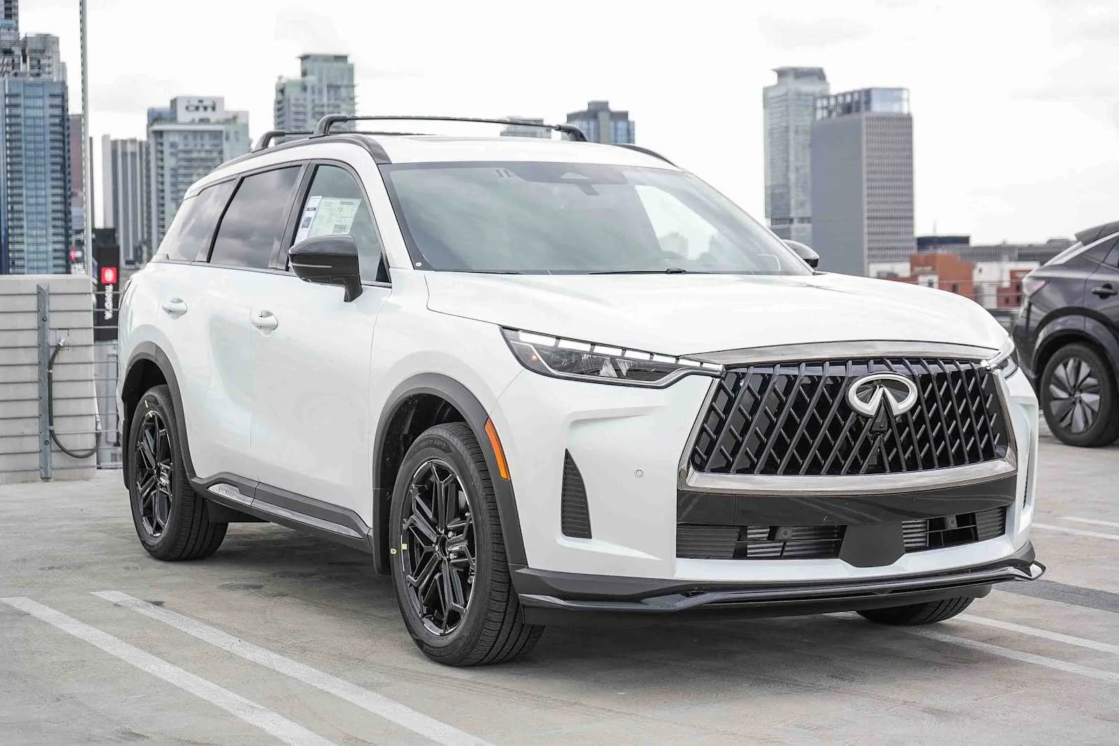 New 2026 RADIANT WHITE INFINITI Sport AWD image 3