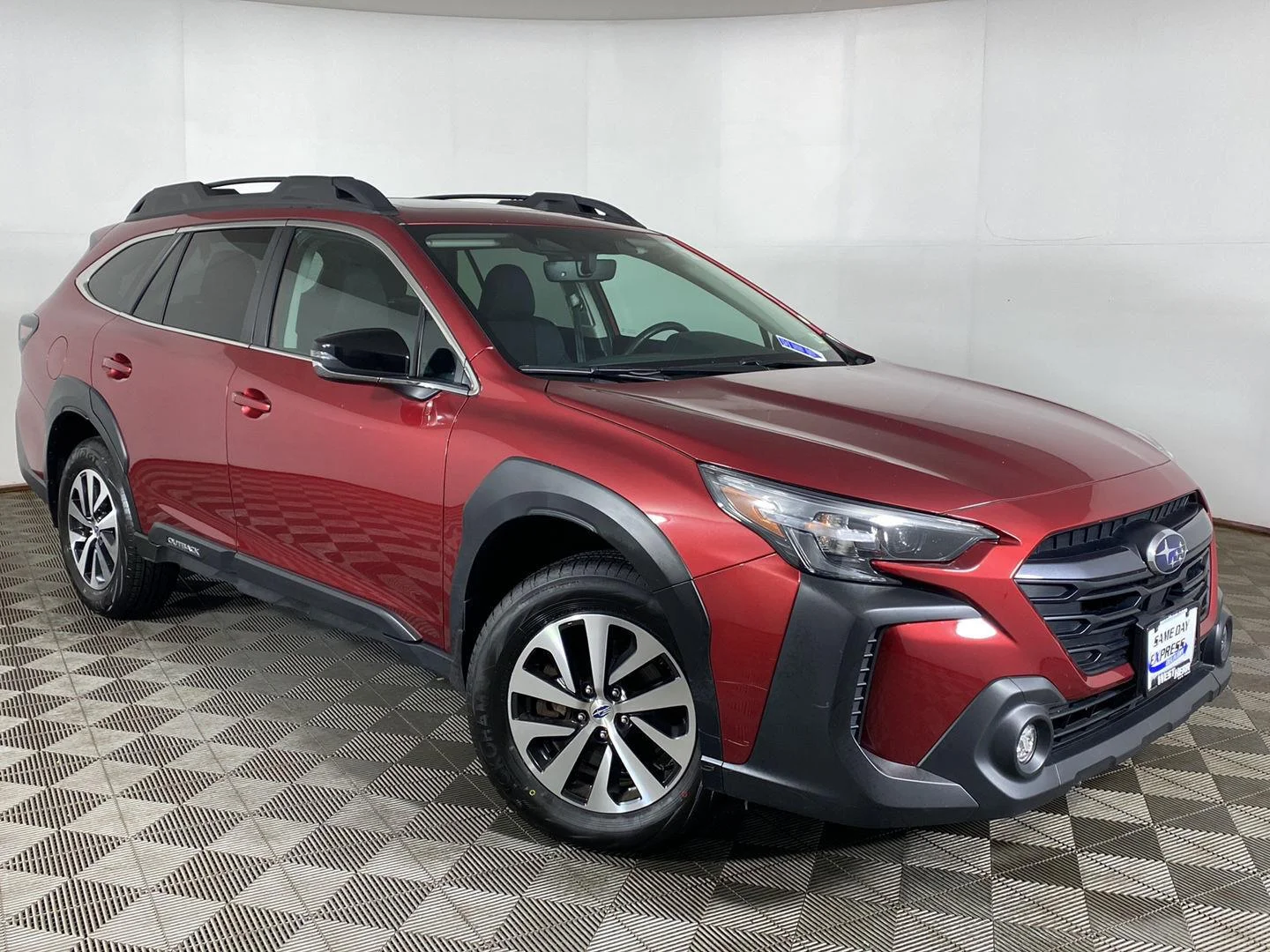 Used 2025 Crimson Red Pearl Subaru Premium image 1