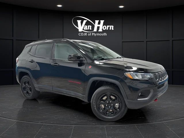 Used 2023 Diamond Black Jeep Trailhawk image 1