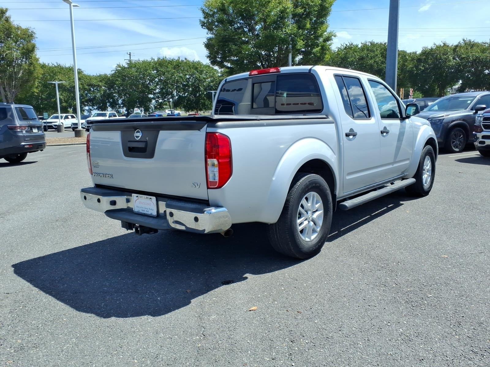 Used 2015 Brilliant Silver Nissan SV image 2