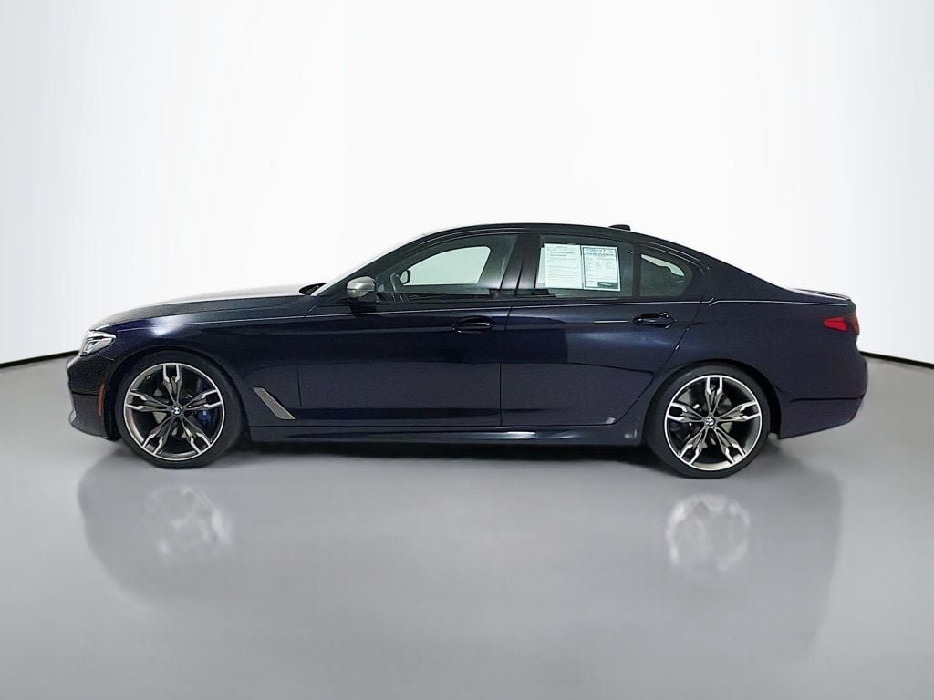 Used 2021 Carbon Black Metallic BMW M550i xDrive image 4