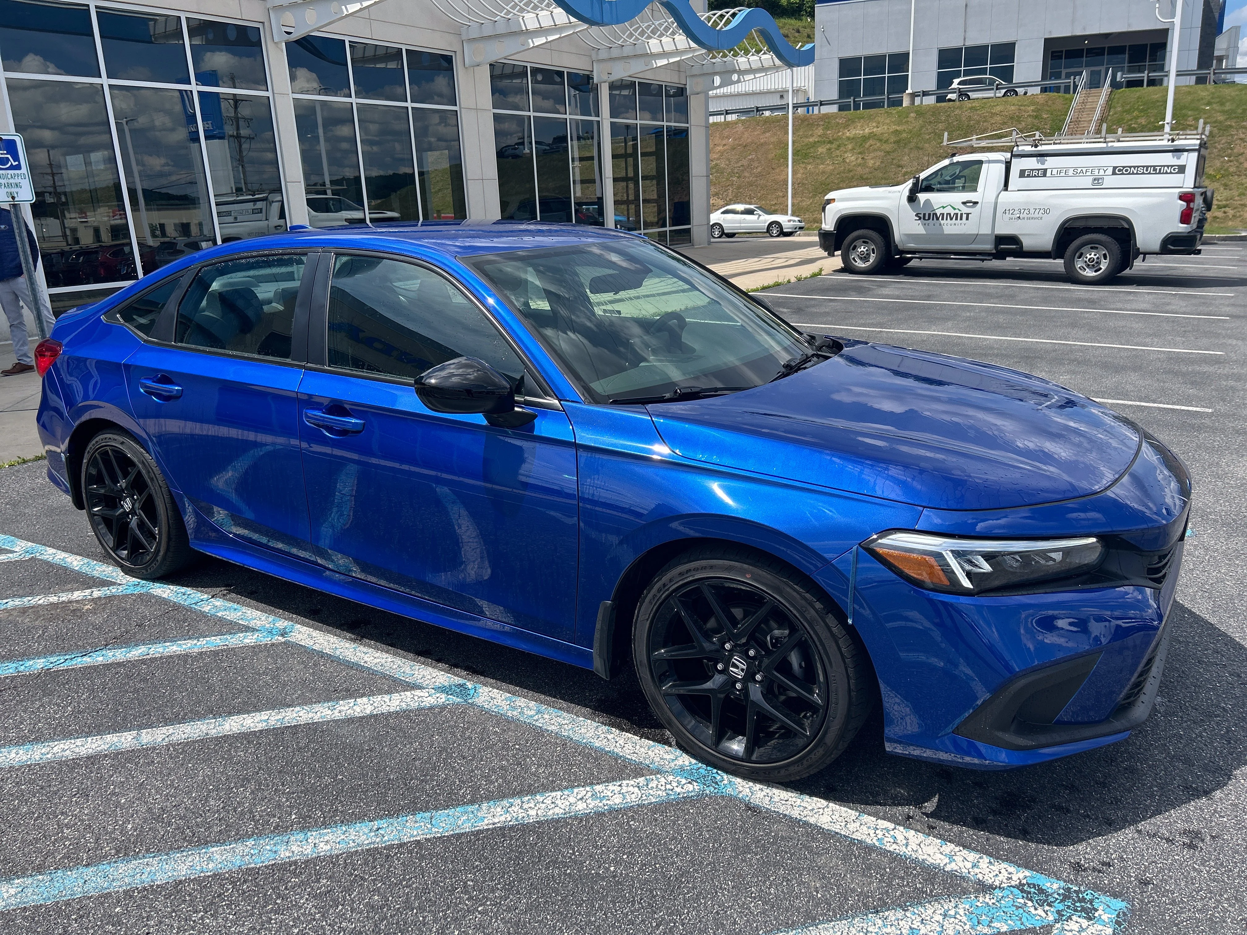 Certified Used 2024 Aegean Blue Metallic Honda Sport image 1