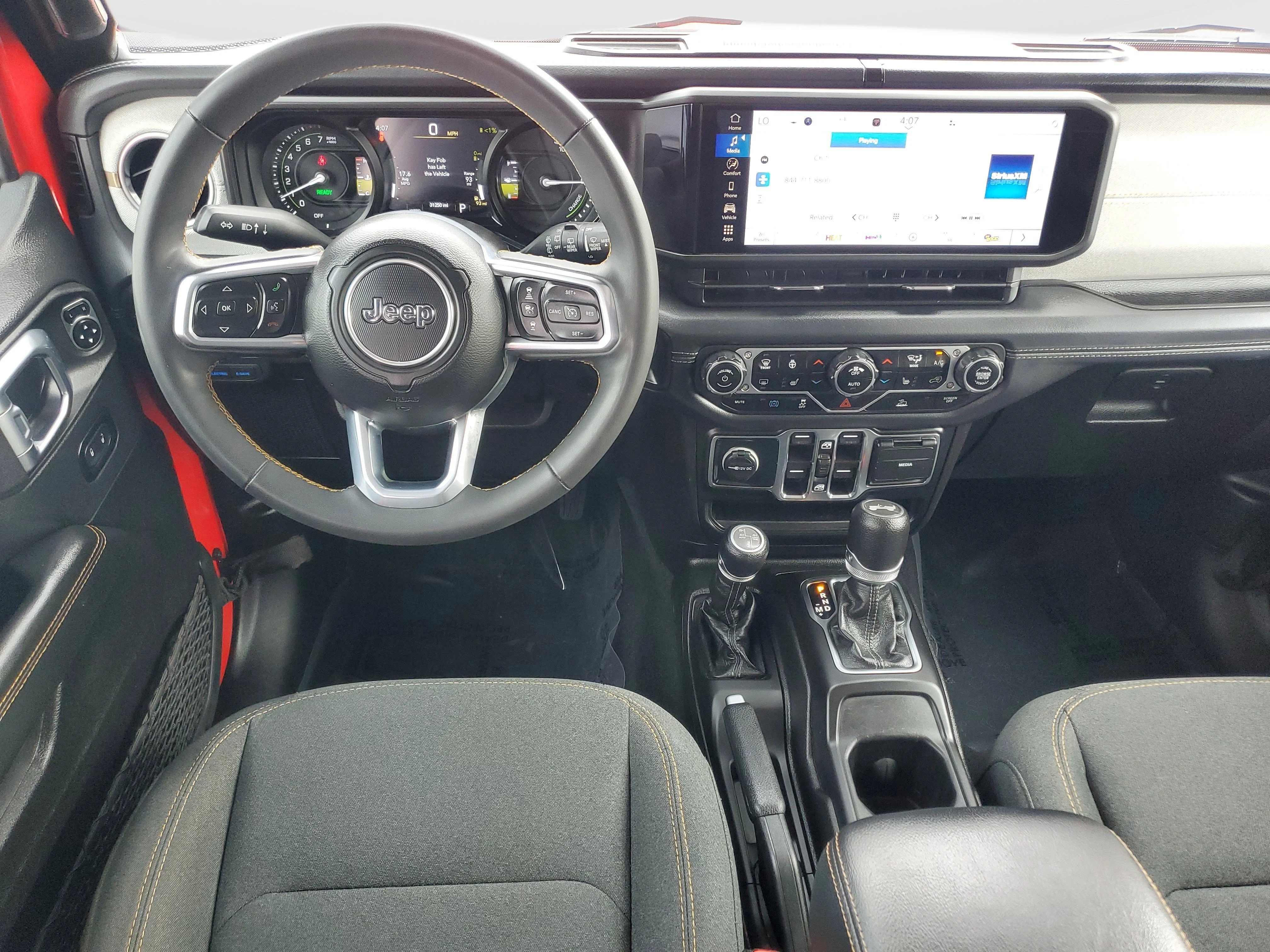 Used 2024 Red Jeep Sahara 4xe image 16